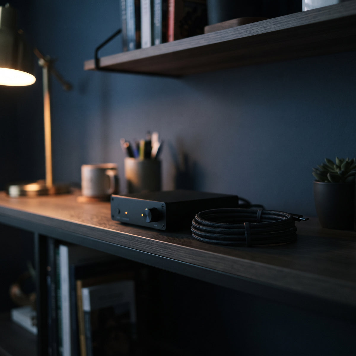 Recorder box and coiled cable on a shelf